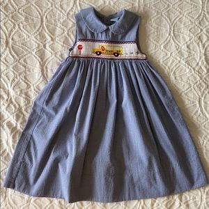 Girls Blue gingham smocked school bus dress